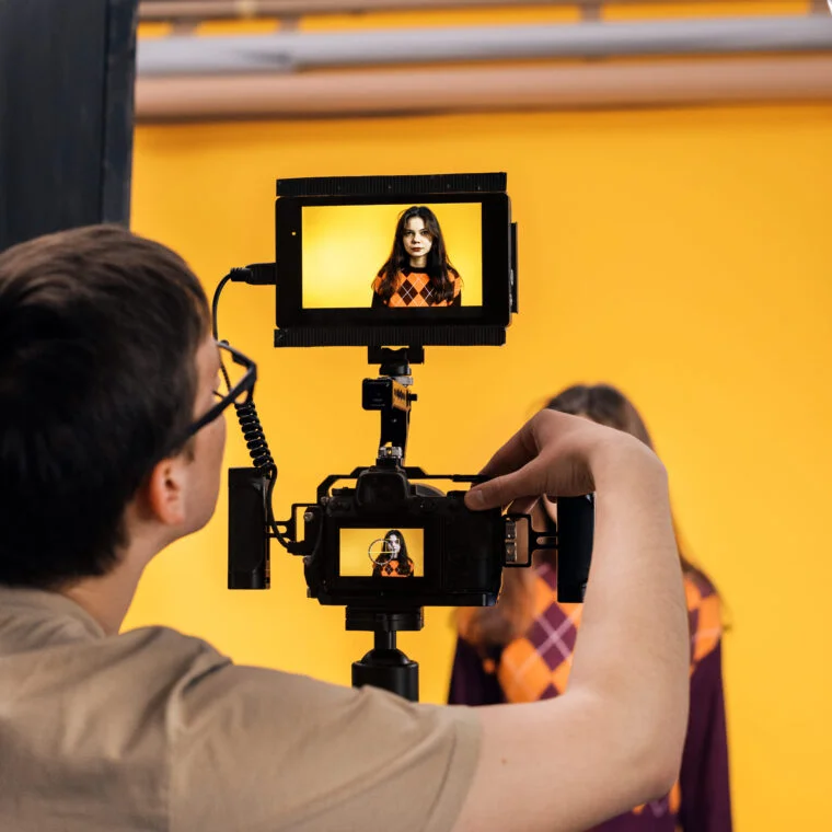 professional-photographer-shooting-a-young-woman-2025-02-19-20-51-24-utc-2-760×760